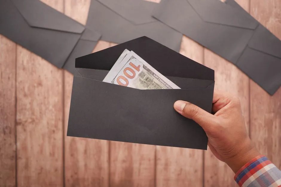 Envelope with cash representing a security deposit payment